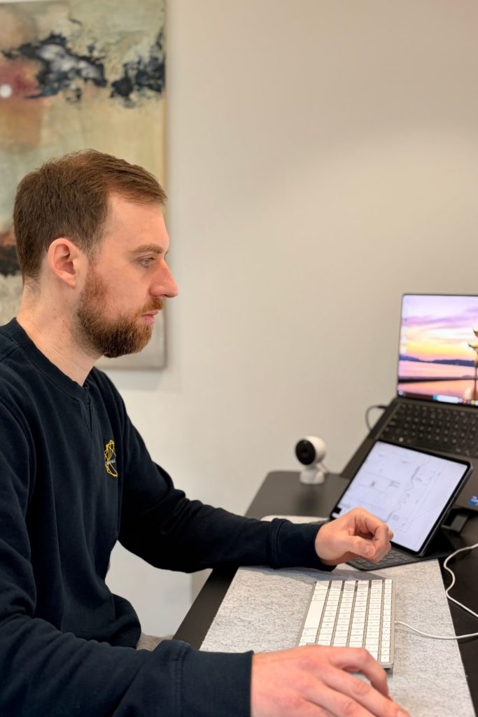 Chris Smalley working at desk